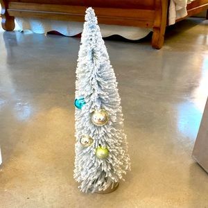 18 inch flocked bottle brush tree decor. Hobby lobby.